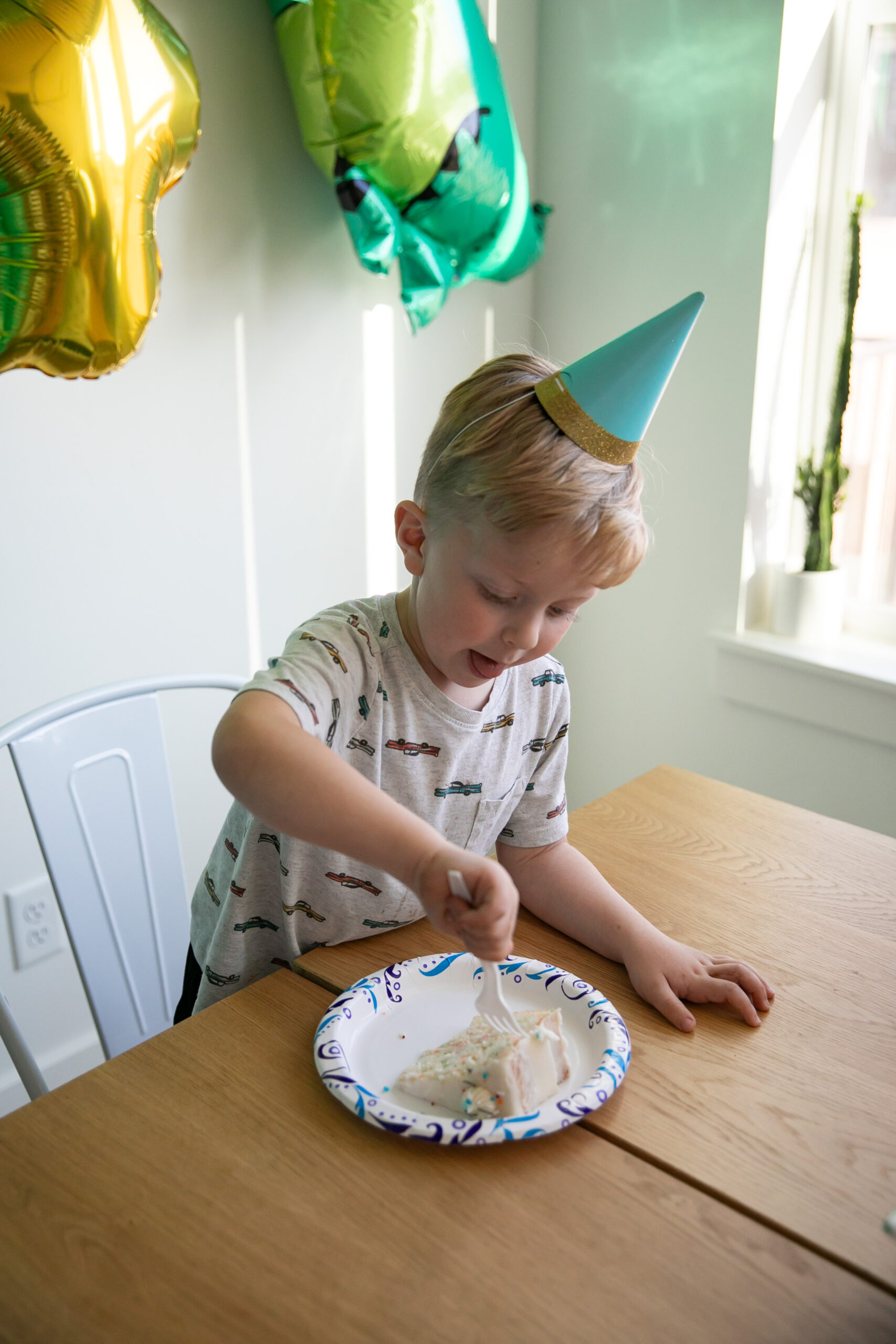 boy eating birthday cake